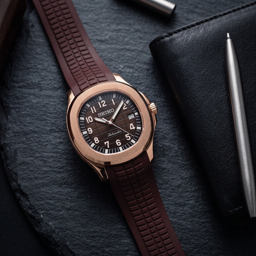 Aqua Mod – Rose Gold Brown Dial – 41mm – Automatic – lifestyle flat lay