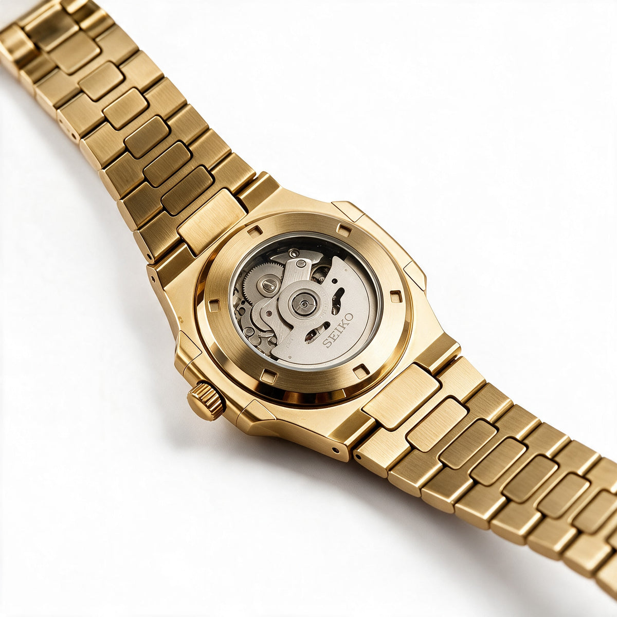 Exhibition case back with the Seiko NH35 automatic movement - yellow gold