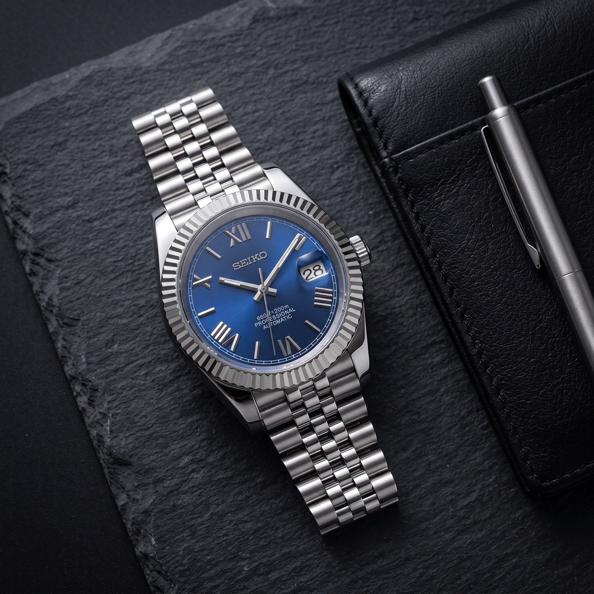 Date Mod – Steel · Blue Roman Dial – Automatic – lifestyle flat lay