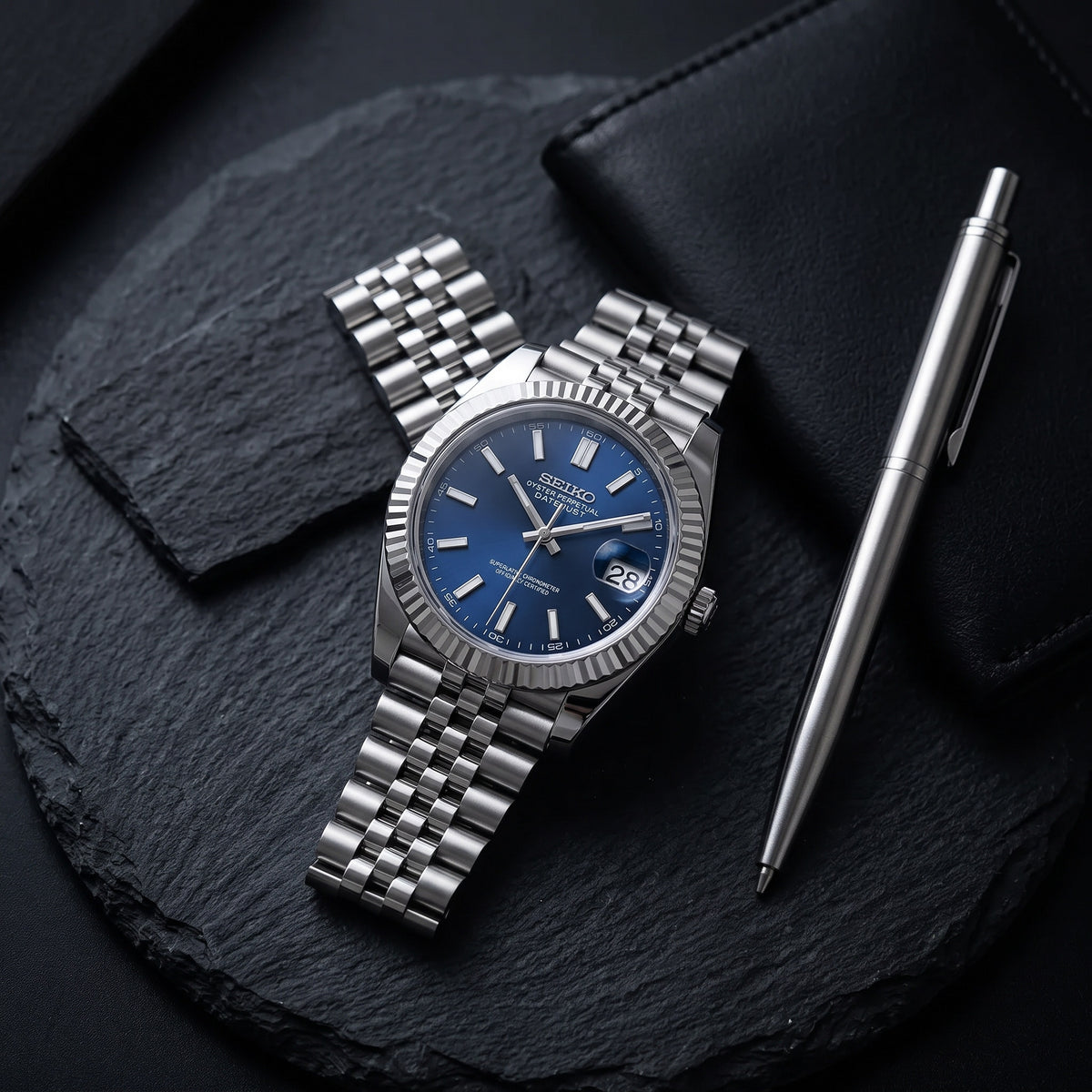 Date Mod – Steel · Blue Stick Dial II – Automatic – lifestyle flat lay