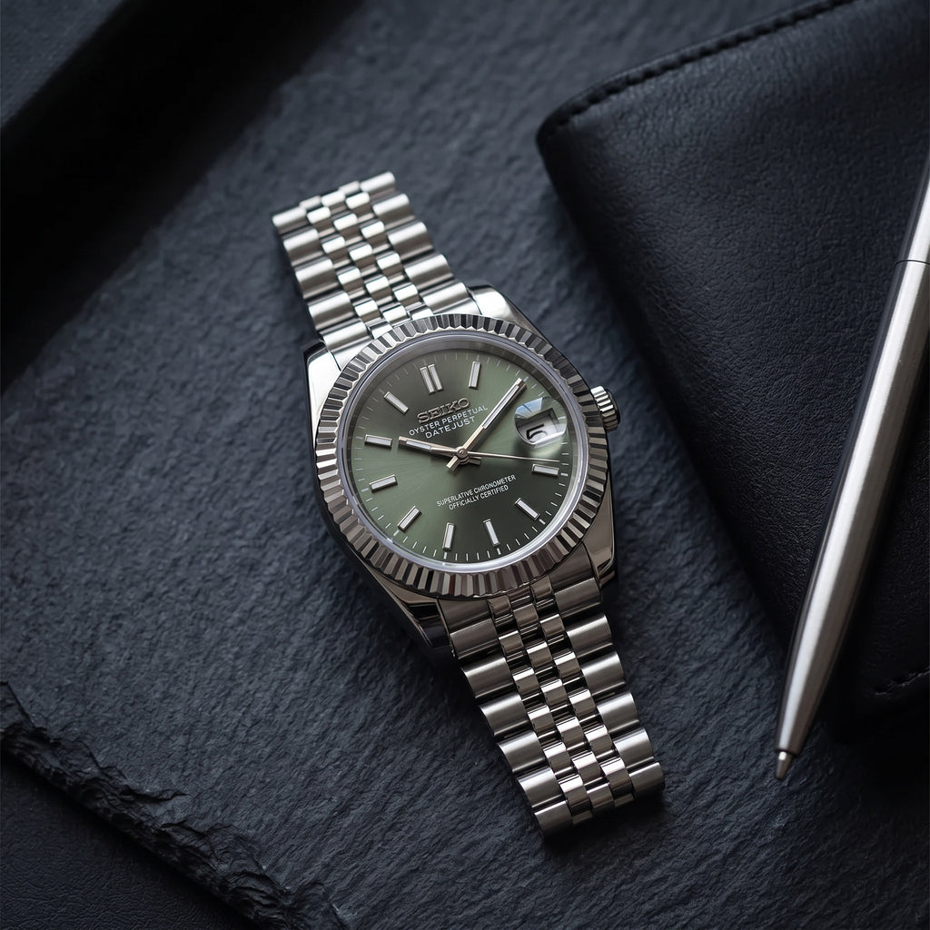 Date Mod – Steel · Green Stick Dial III – Automatic – lifestyle flat lay