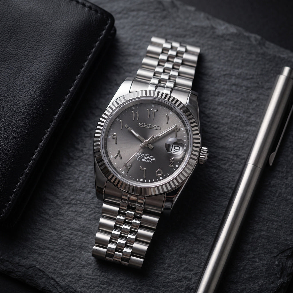 Date Mod – Steel · Grey Arabic Dial II – Automatic – lifestyle flat lay