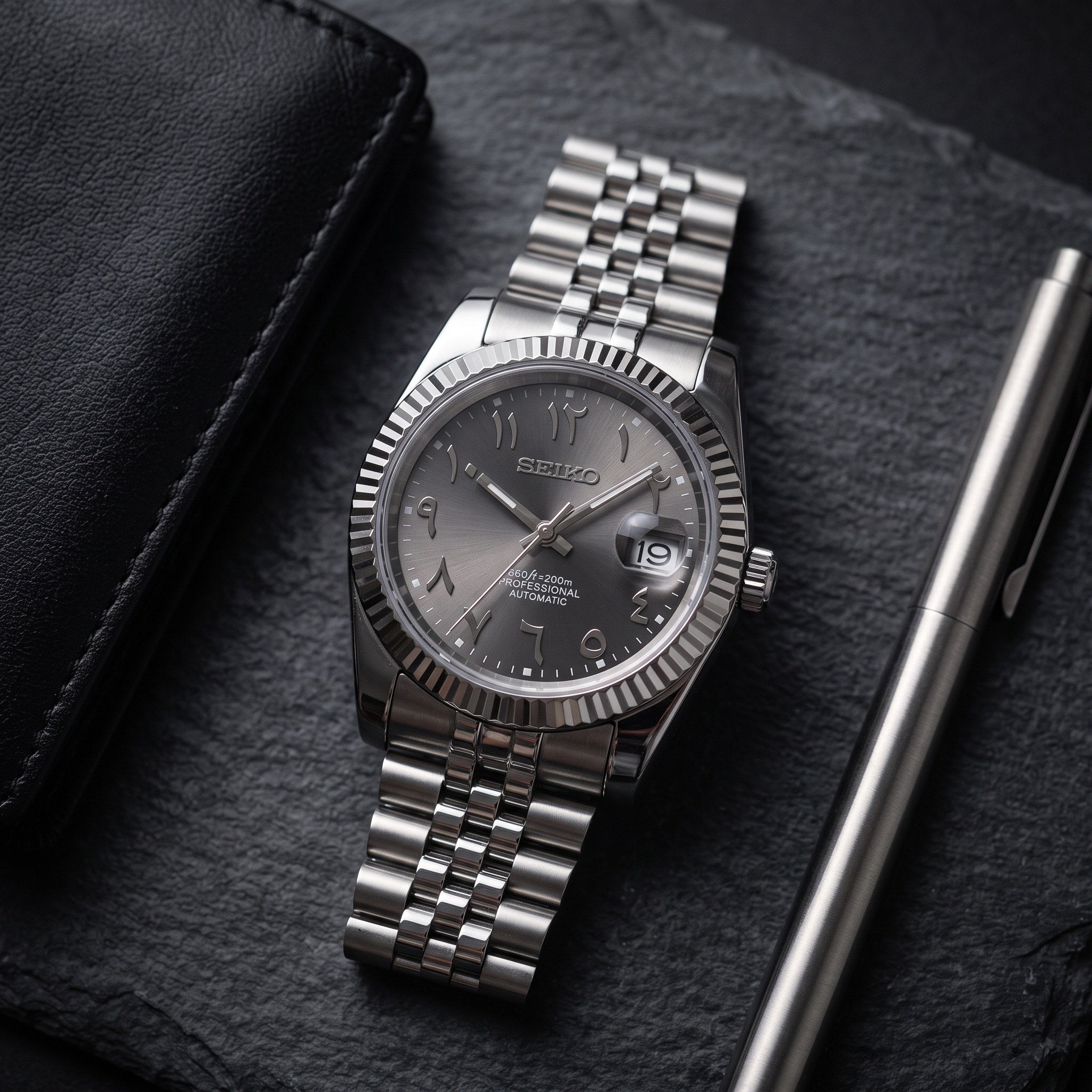 Date Mod – Steel · Grey Arabic Dial II – Automatic – lifestyle flat lay