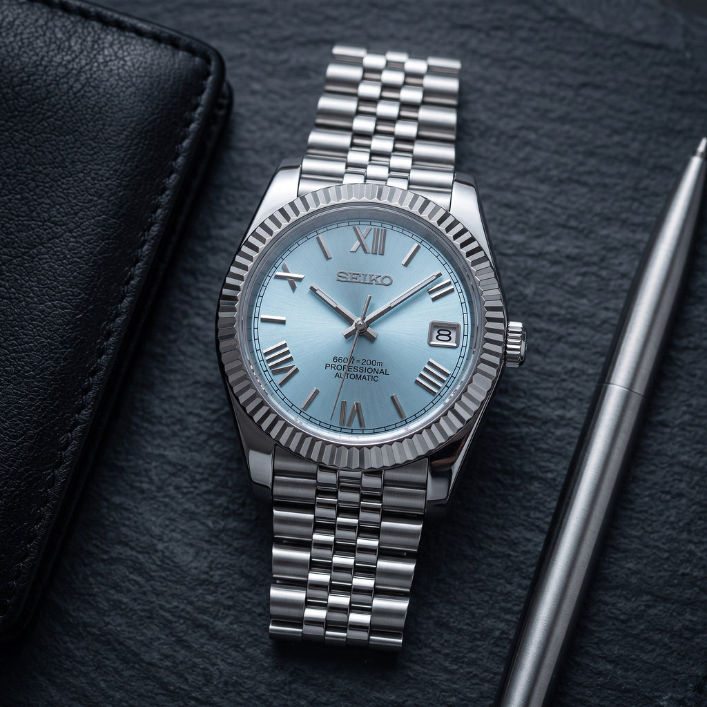Date Mod – Steel · Ice-Blue Roman Dial – Automatic – lifestyle flat lay
