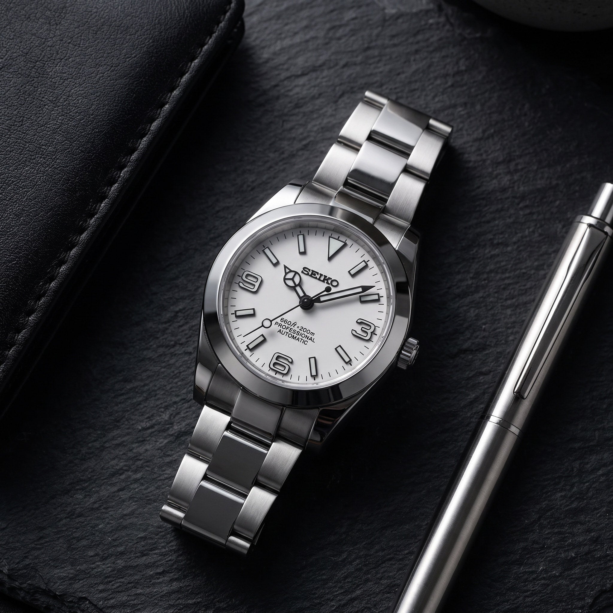 Date Mod – Steel · Silver Explorer Dial – Automatic – lifestyle flat lay