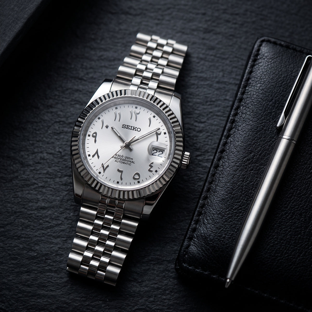 Date Mod – Steel · Silver Roman Dial II – Automatic – lifestyle flat lay