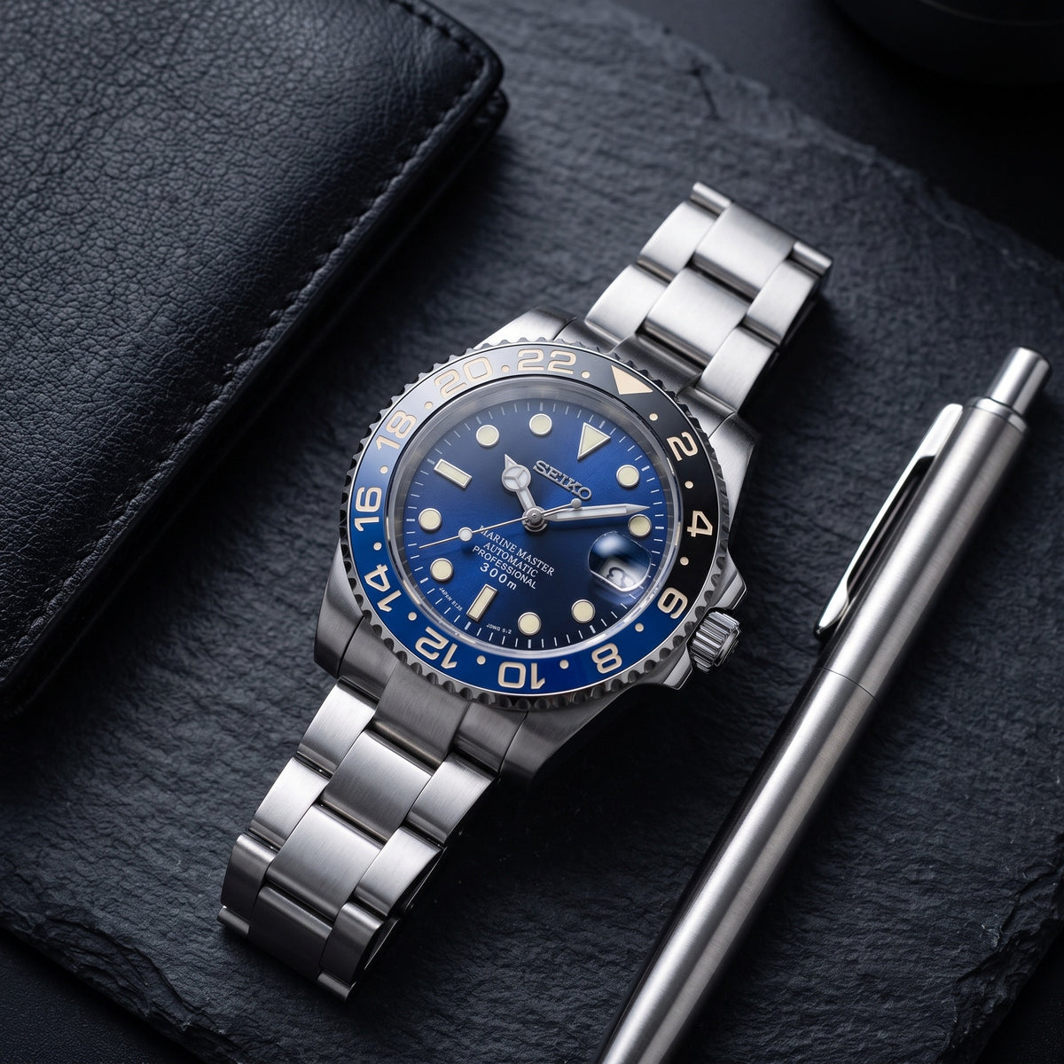 GMT Mod – Steel · Blue-Black Bezel · Blue Dial – 40mm – Automatic GMT – lifestyle flat lay