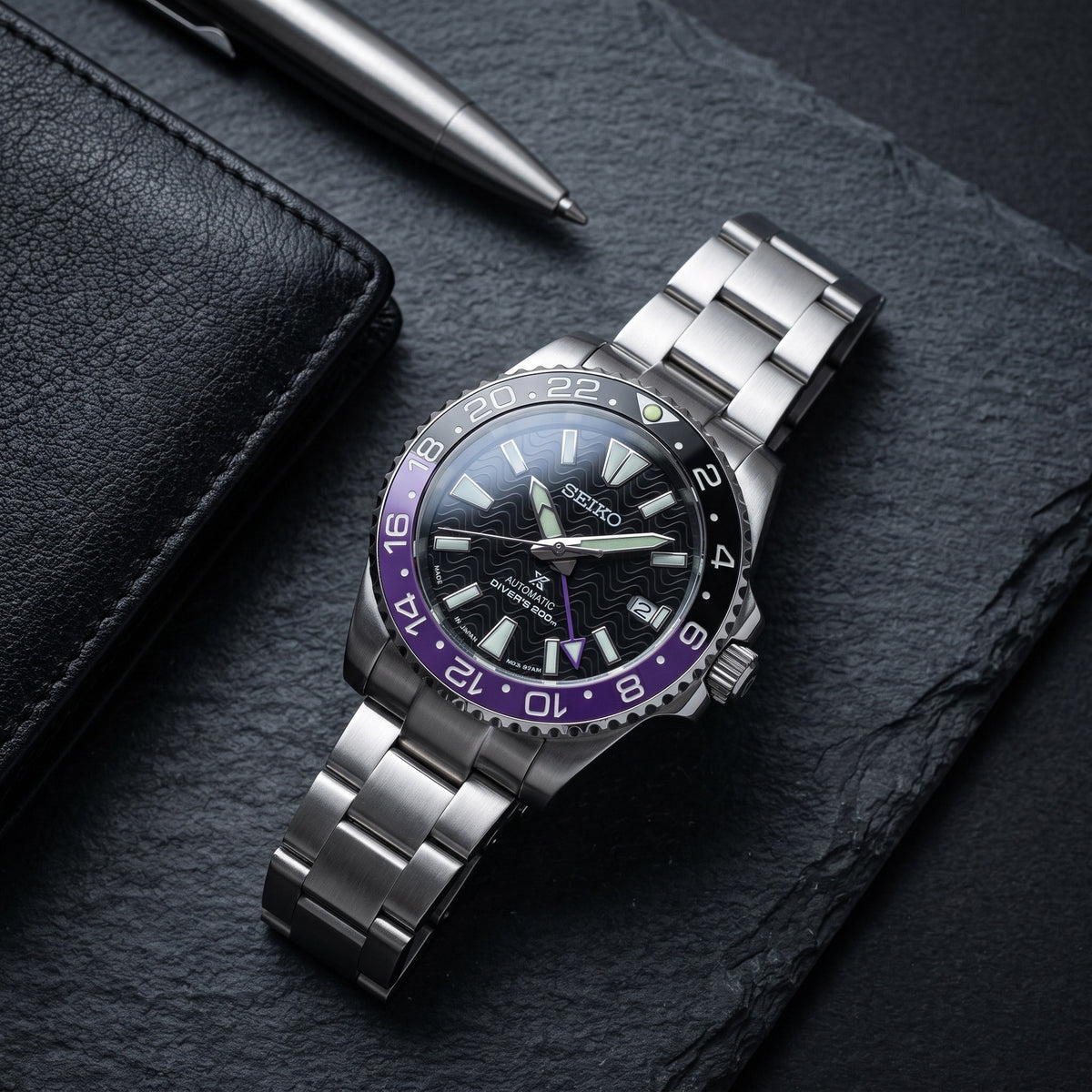GMT Mod – Steel · Purple-Black Bezel – 40mm – Automatic GMT – lifestyle flat lay
