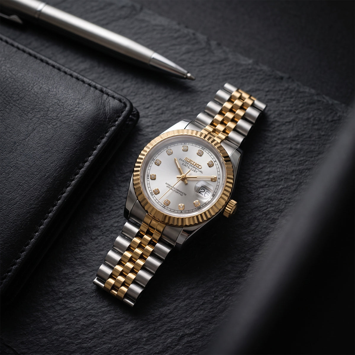Lady Mod – Two-Tone Gold · Silver Diamond Dial – 28mm – Automatic – lifestyle flat lay