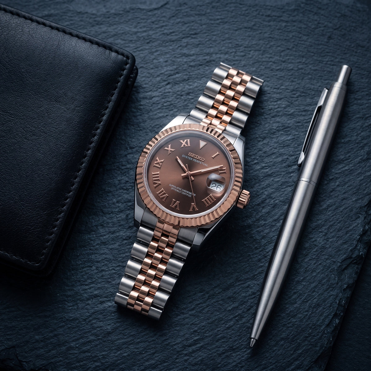 Lady Mod – Two-Tone Rose Gold · Brown Roman Dial – 28mm – Automatic – lifestyle flat lay