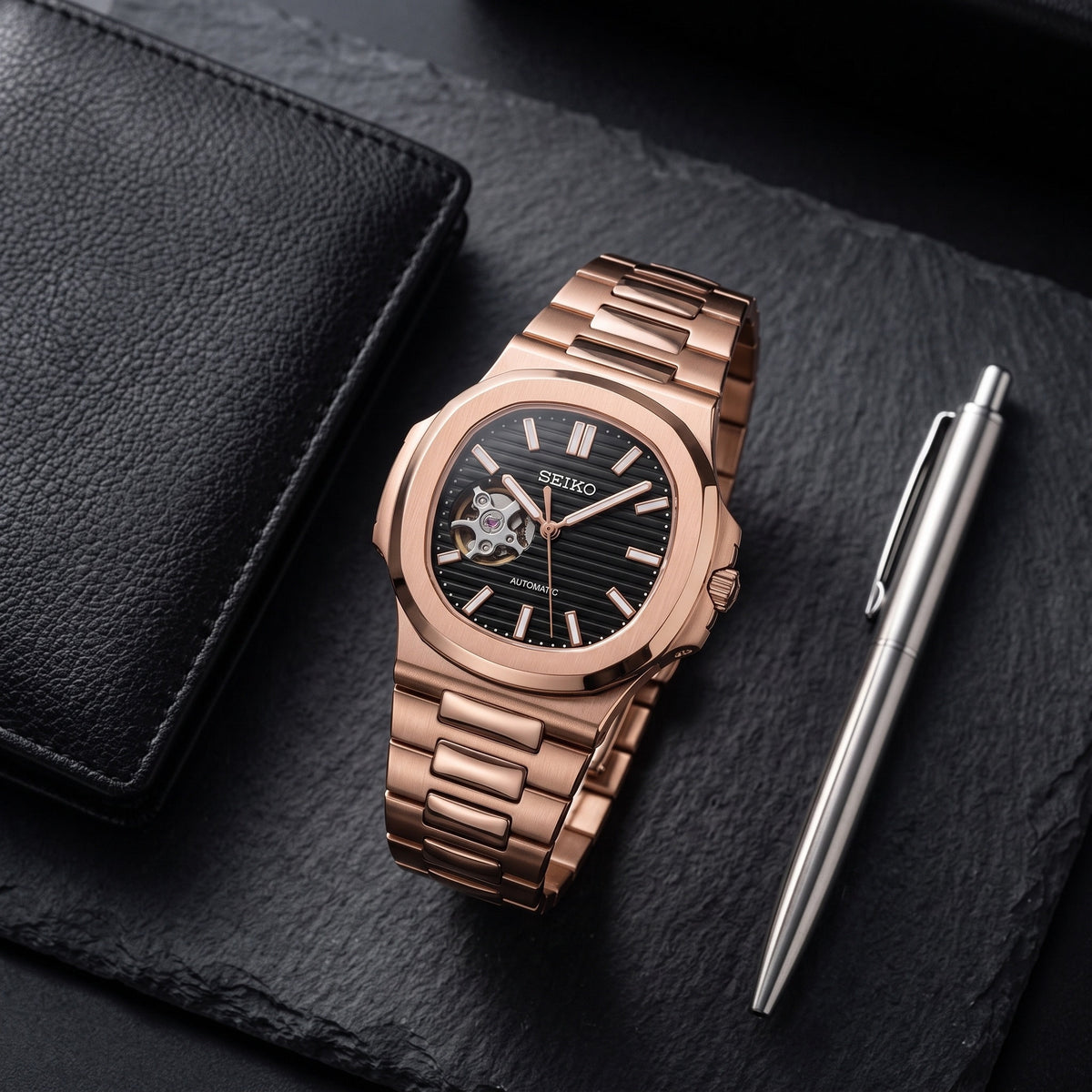 Naut Mod – Rose Gold · Black Open-Heart Dial – 41mm – Automatic – lifestyle flat lay
