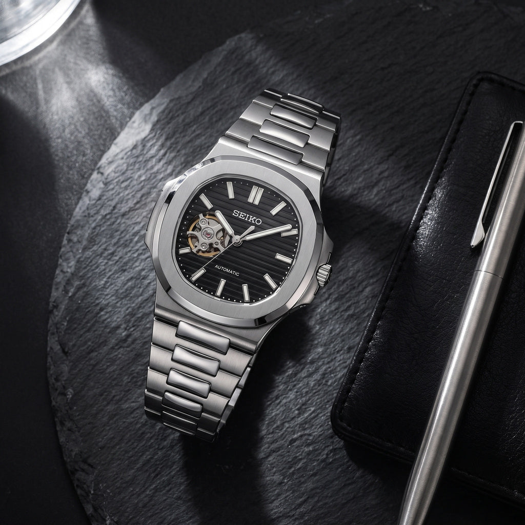 Naut Mod – Steel · Black Open-Heart Dial – 41mm – Automatic – lifestyle flat lay