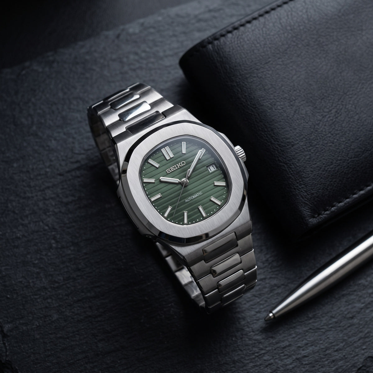 Naut Mod – Steel · Green Dial – 41mm – Automatic – lifestyle flat lay