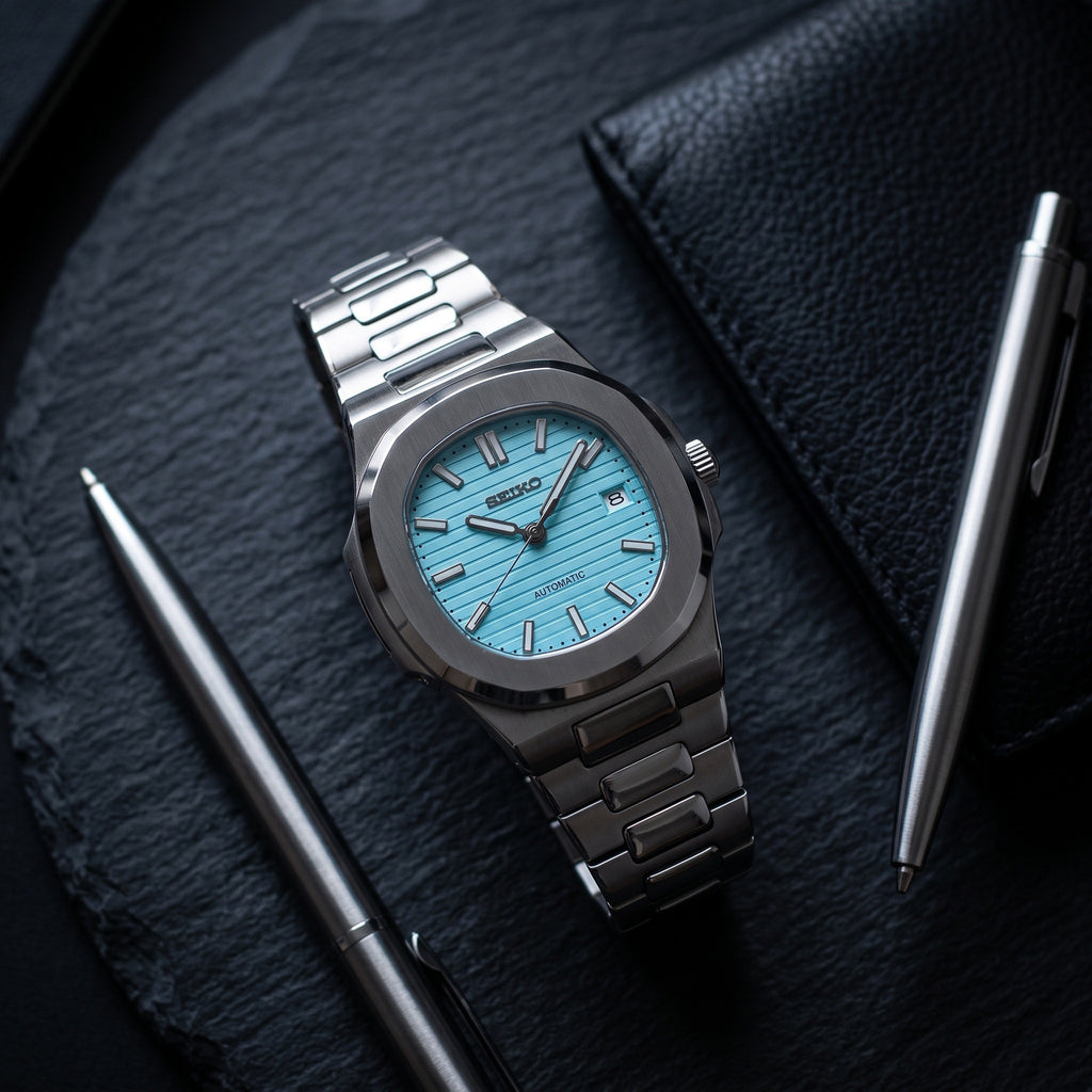 Naut Mod – Steel · Ice-Blue Dial – 41mm – Automatic – lifestyle flat lay