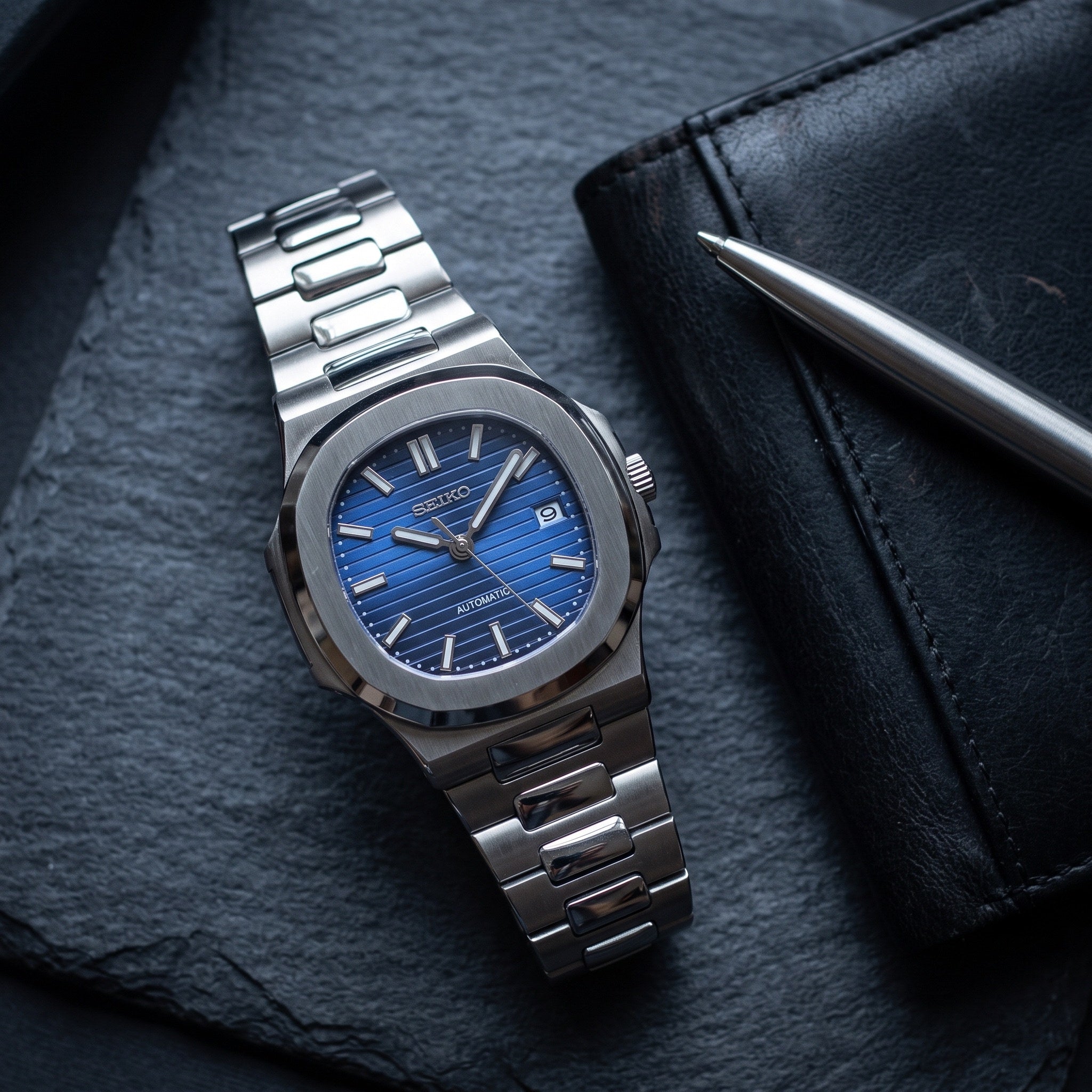 Naut Mod – Steel · Royal Blue Dial – 41mm – Automatic – lifestyle flat lay
