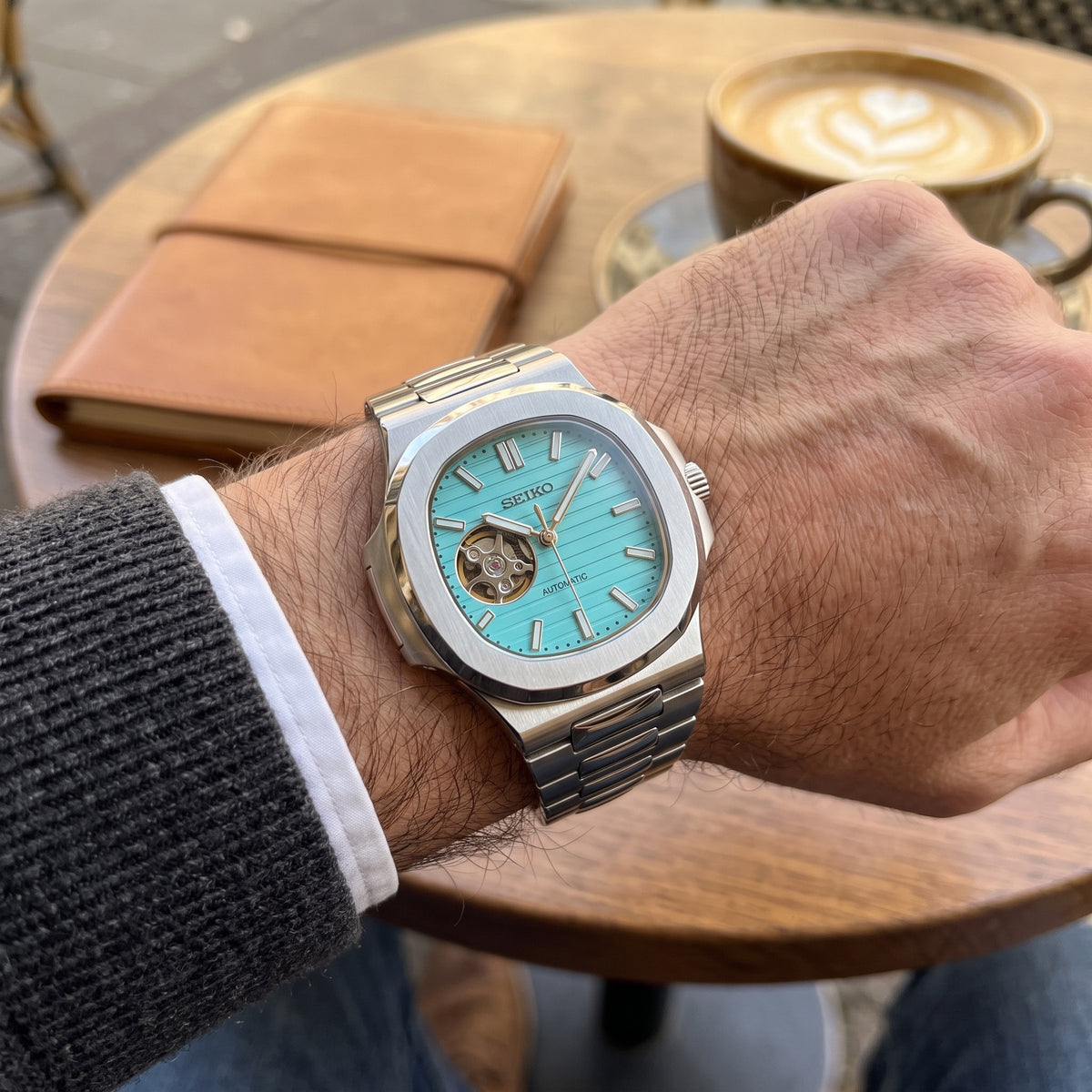 Naut Mod – Steel · Teal Open-Heart Dial – 41mm – Automatic – on-wrist view