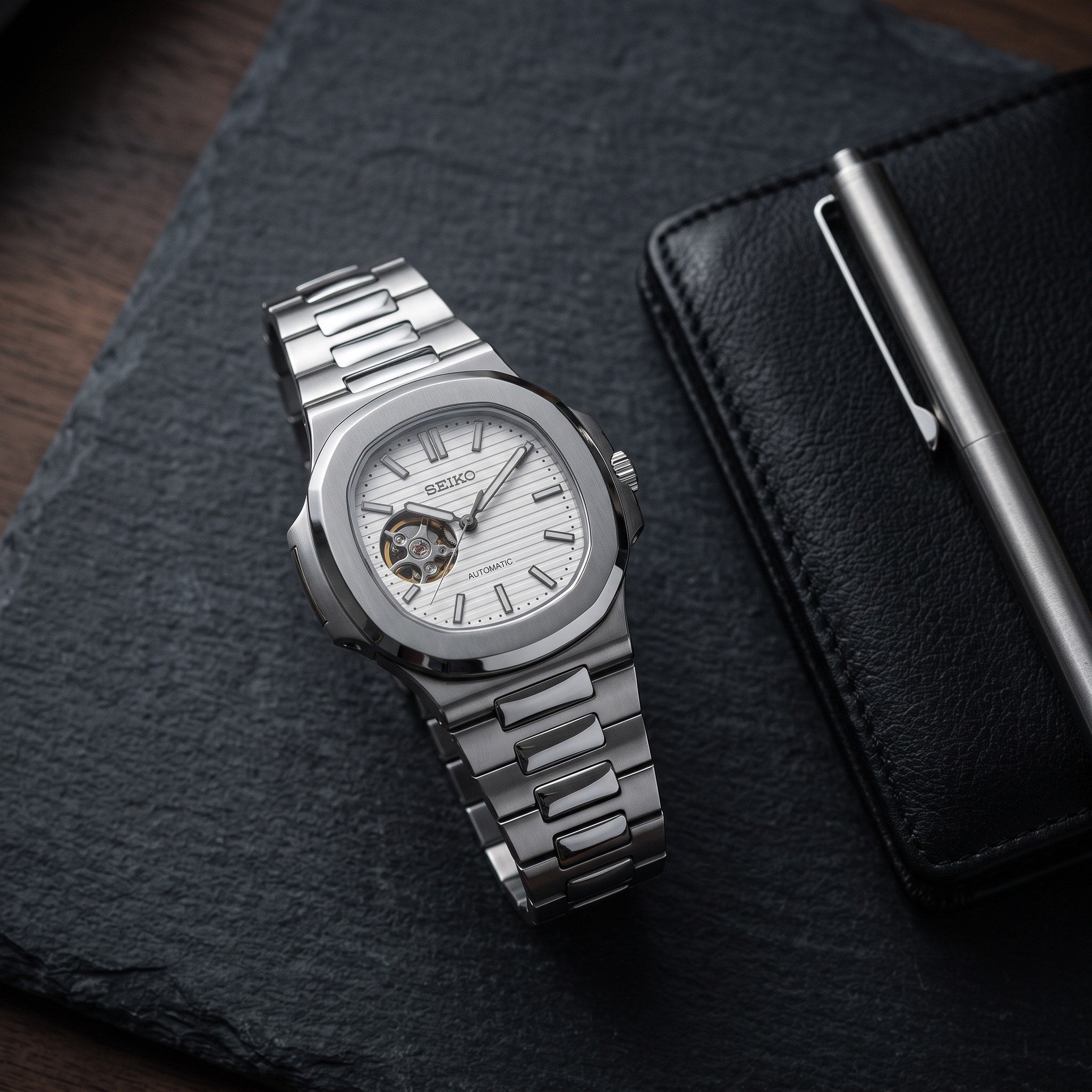 Naut Mod – Steel · White Open-Heart Dial – 41mm – Automatic – lifestyle flat lay