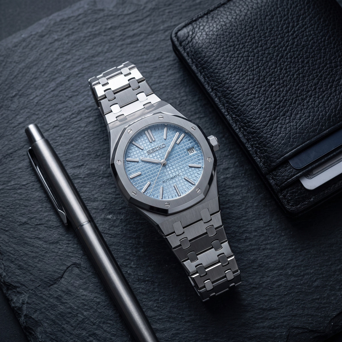 Oak Mod – Steel · Ice-Blue Dial – 41mm – Automatic – lifestyle flat lay