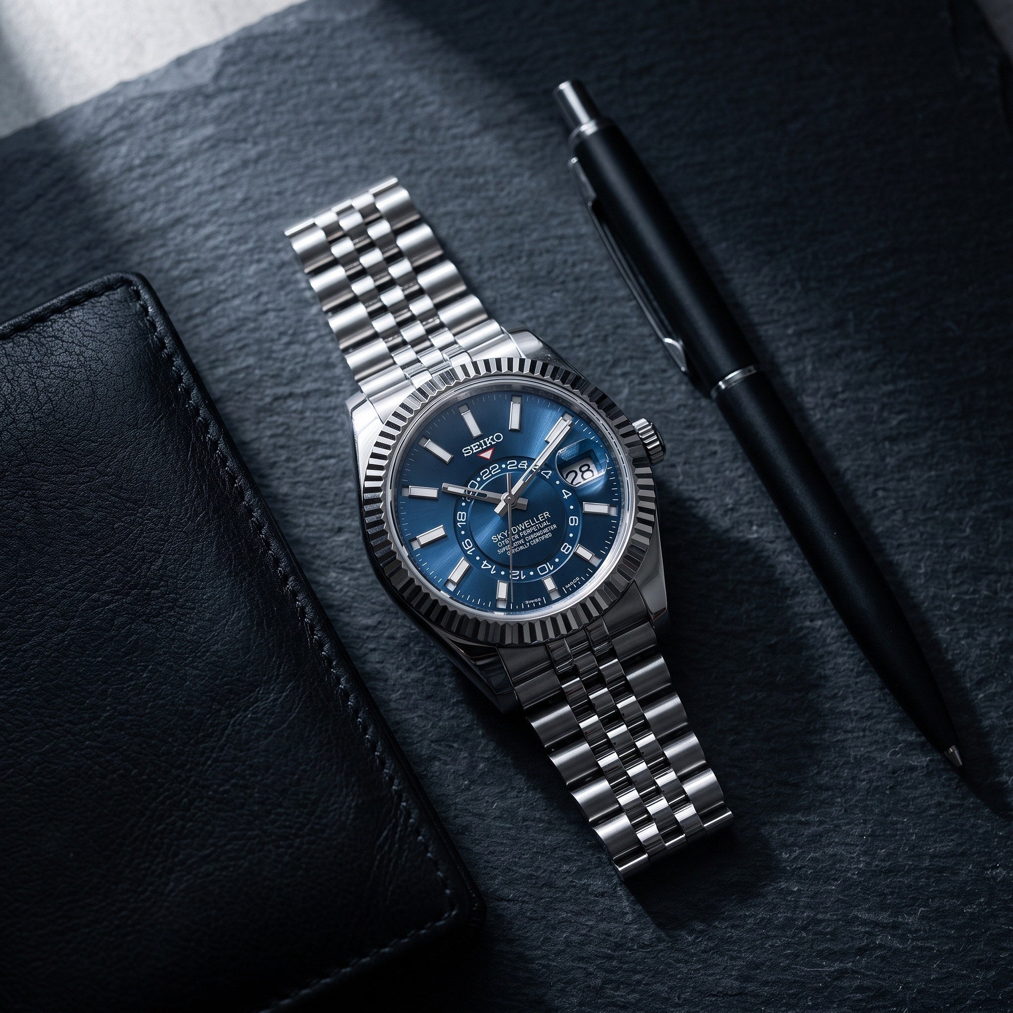 Sky Mod – Blue Dial – 41mm – Automatic – lifestyle flat lay