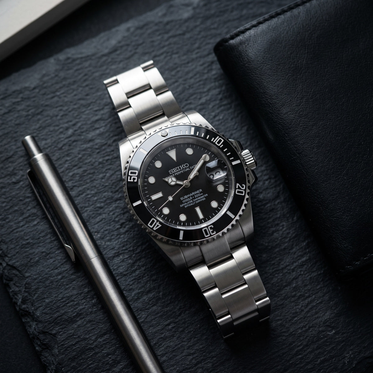 Sub Mod – Black Dial – 40mm – Automatic – lifestyle flat lay