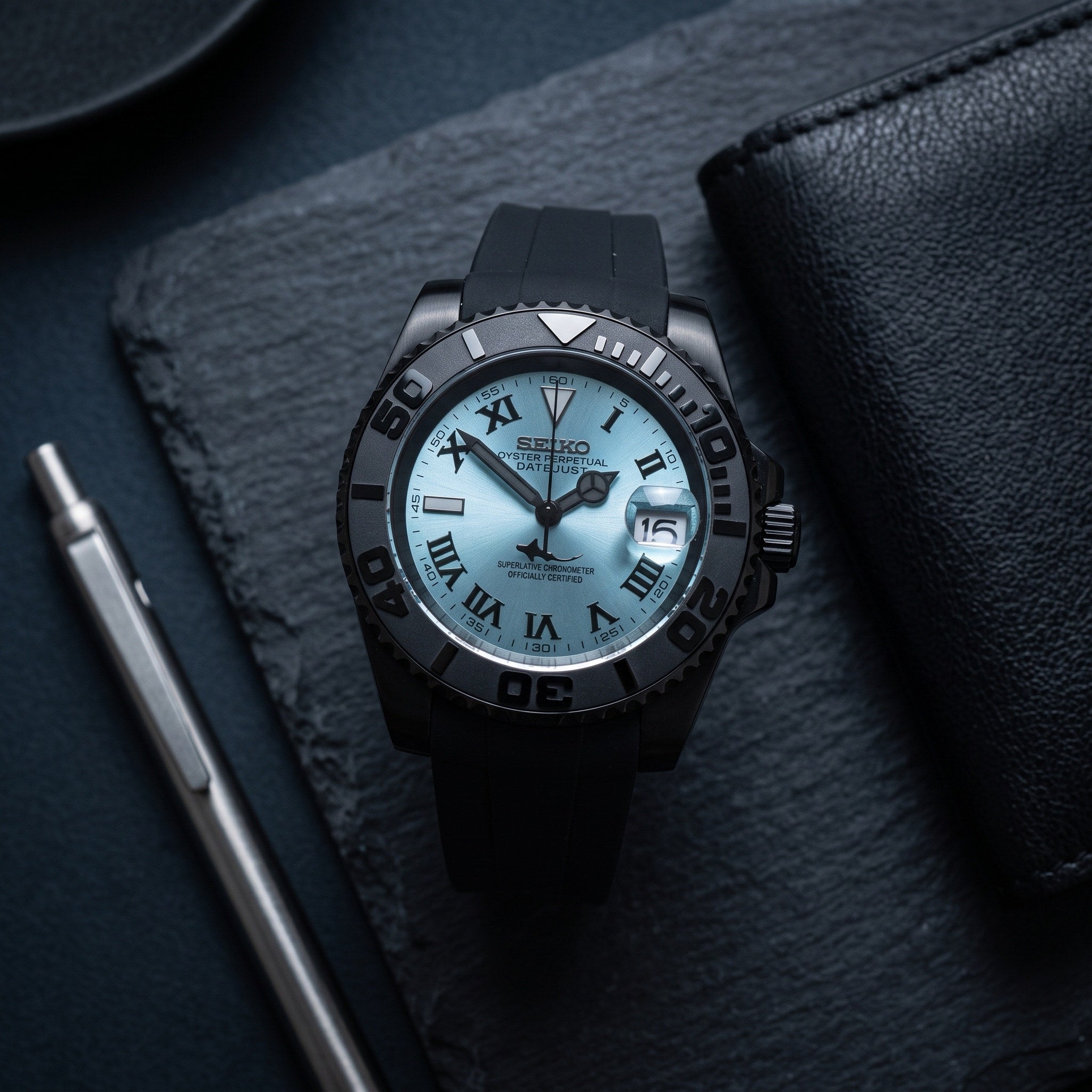 Sub Mod – Black Ice Blue Dial – 40mm – Automatic – lifestyle flat lay