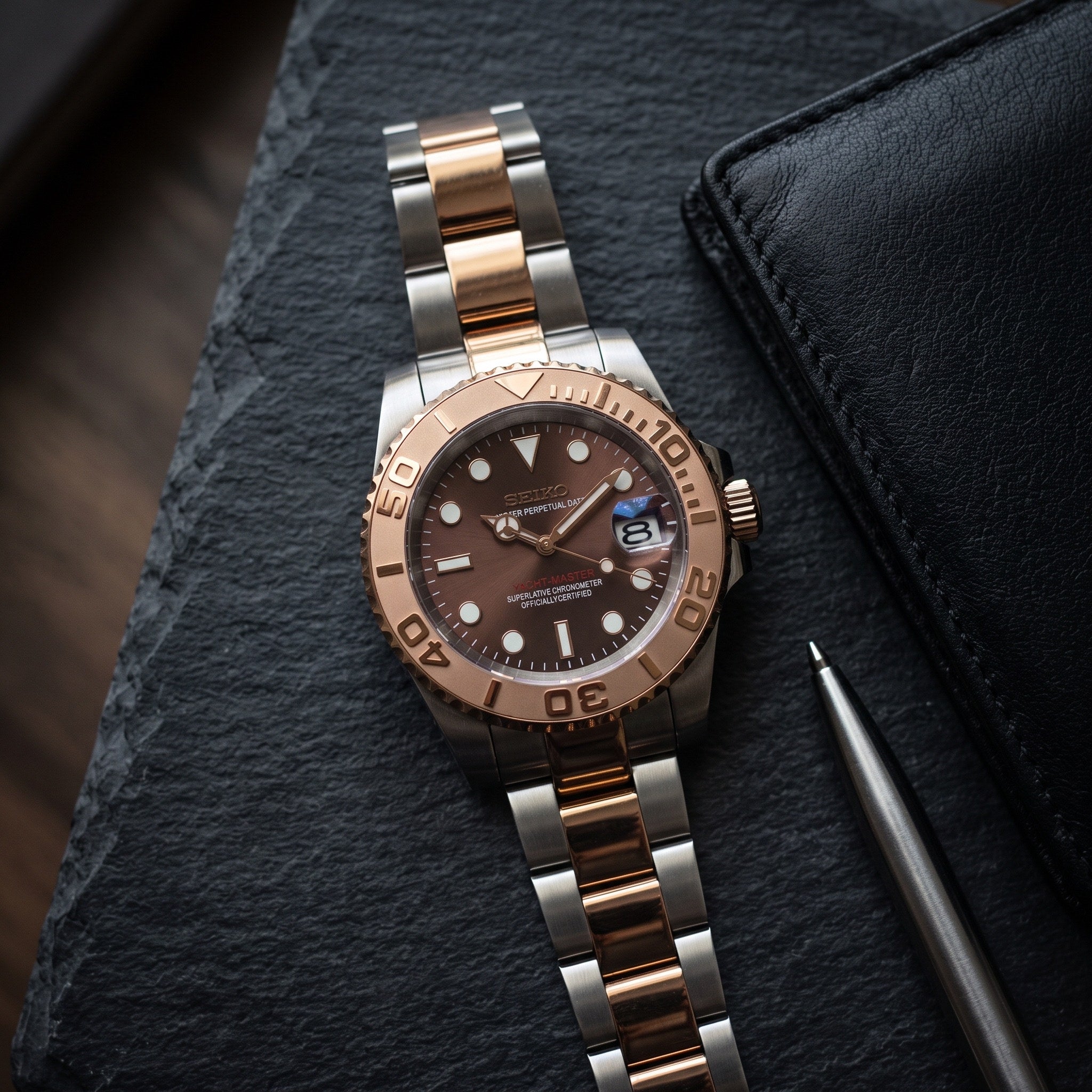 Sub Mod – Two-Tone Rose Gold Brown Dial – 40mm – Automatic – lifestyle flat lay