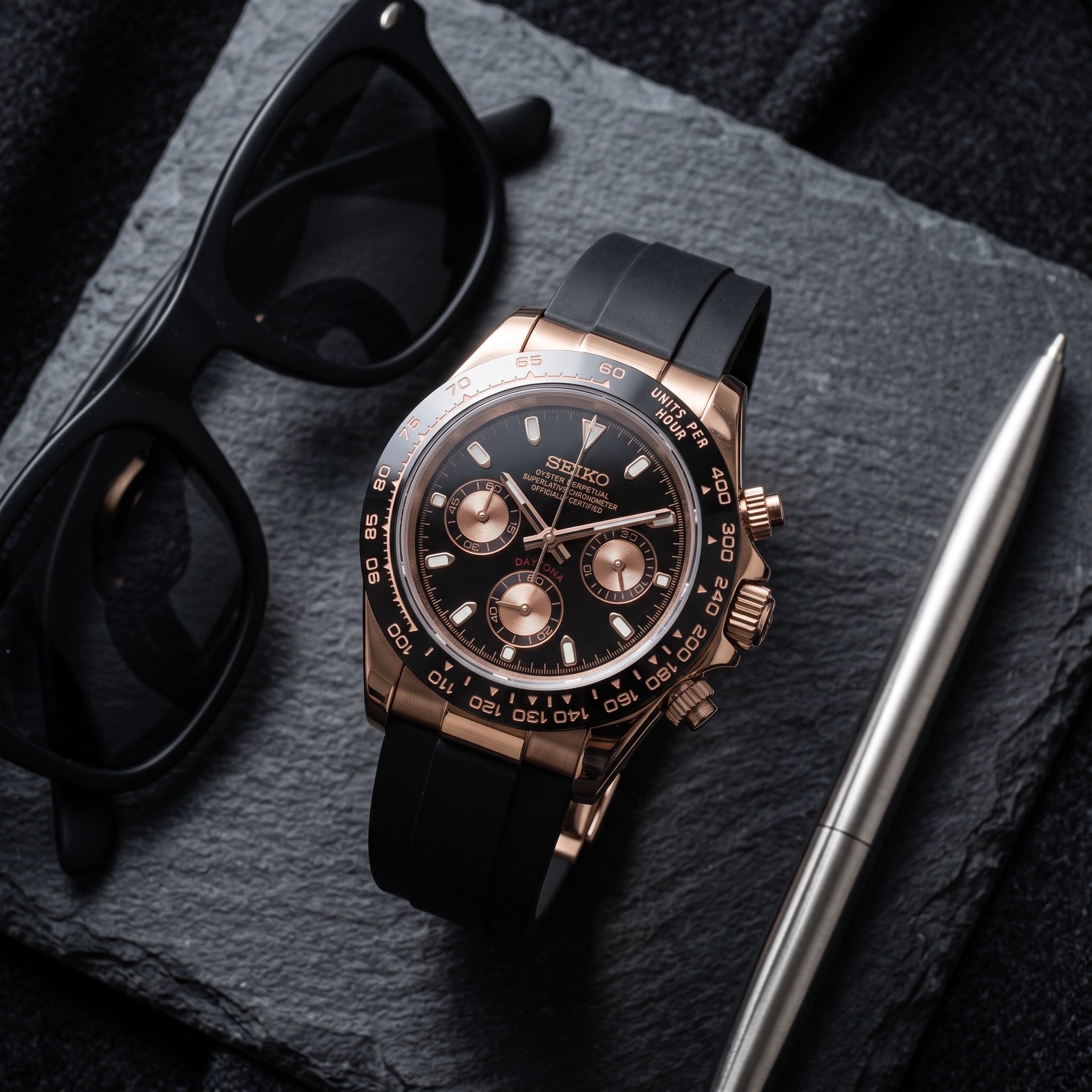 Tona Mod – Rose Gold · Black Dial · Rubber – 40mm – Chronograph – lifestyle flat lay