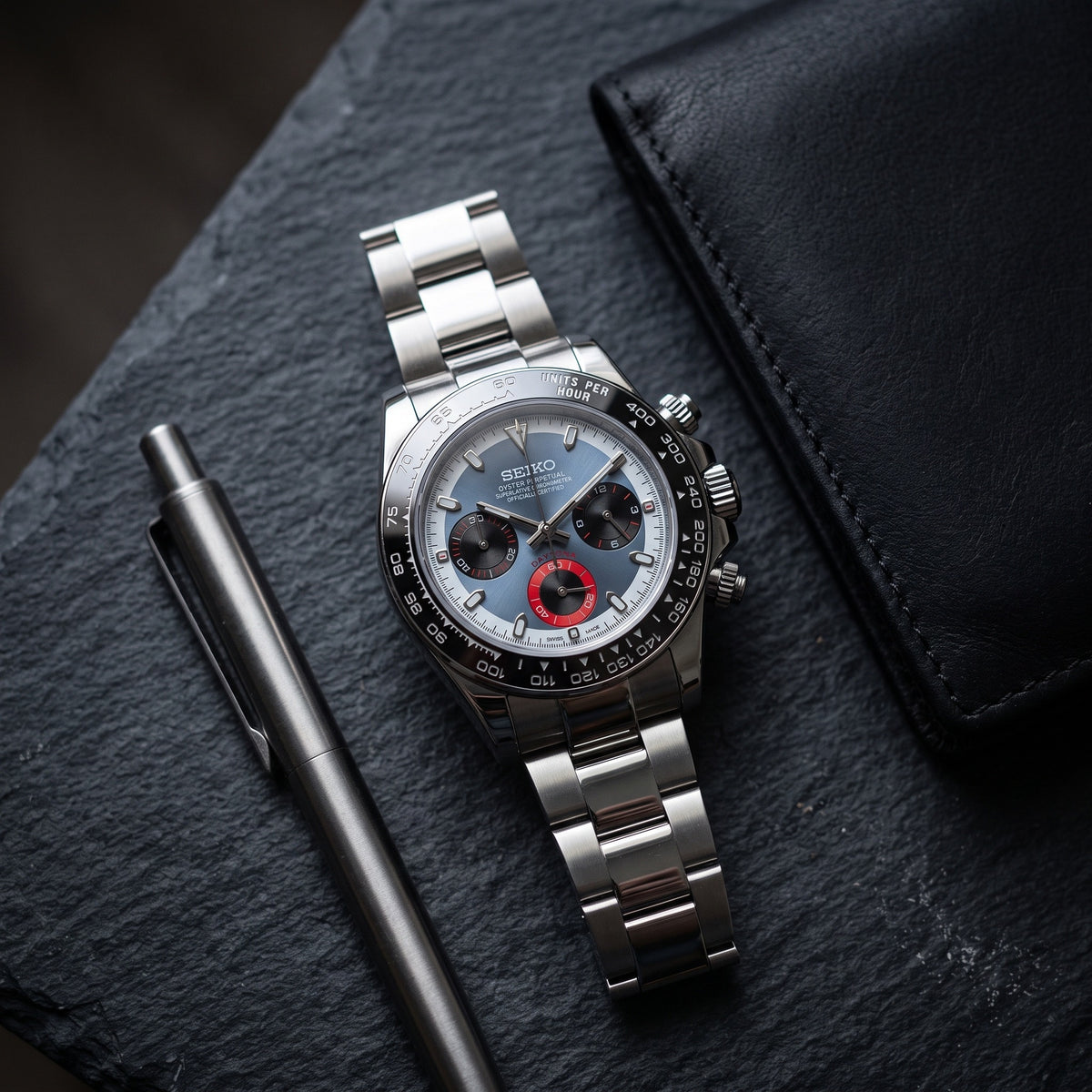 Tona Mod – Steel · Blue Dial Red Accents – 40mm – Chronograph – lifestyle flat lay
